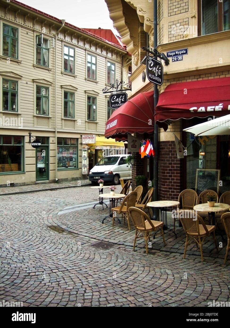 Cafe on corner of cobbled street in Haga, the old working class district of Gothenburg, Sweden, now a prosperous and fashionable area of the city for Stock Photo