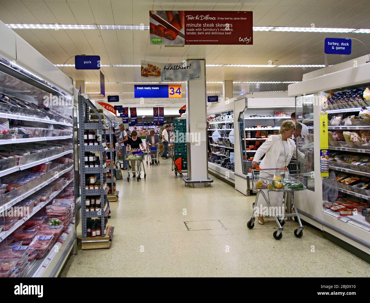 Interior of Sainsbury's supermarket on quiet day - Stock Photo