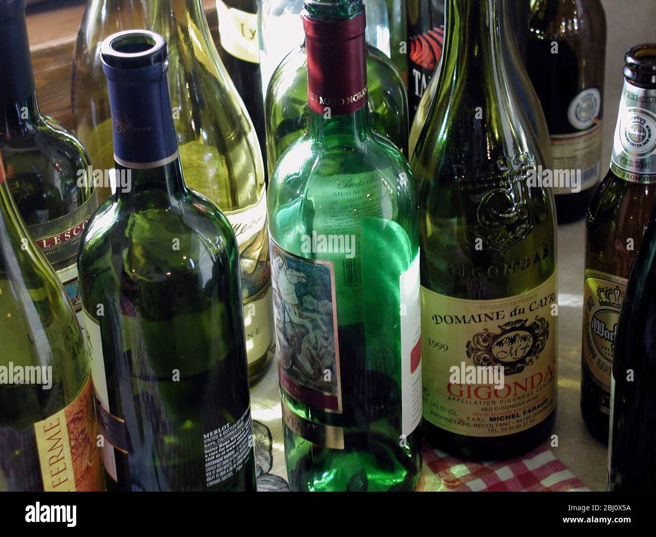 Empty wine bottles gathered up after a party Stock Photo Alamy