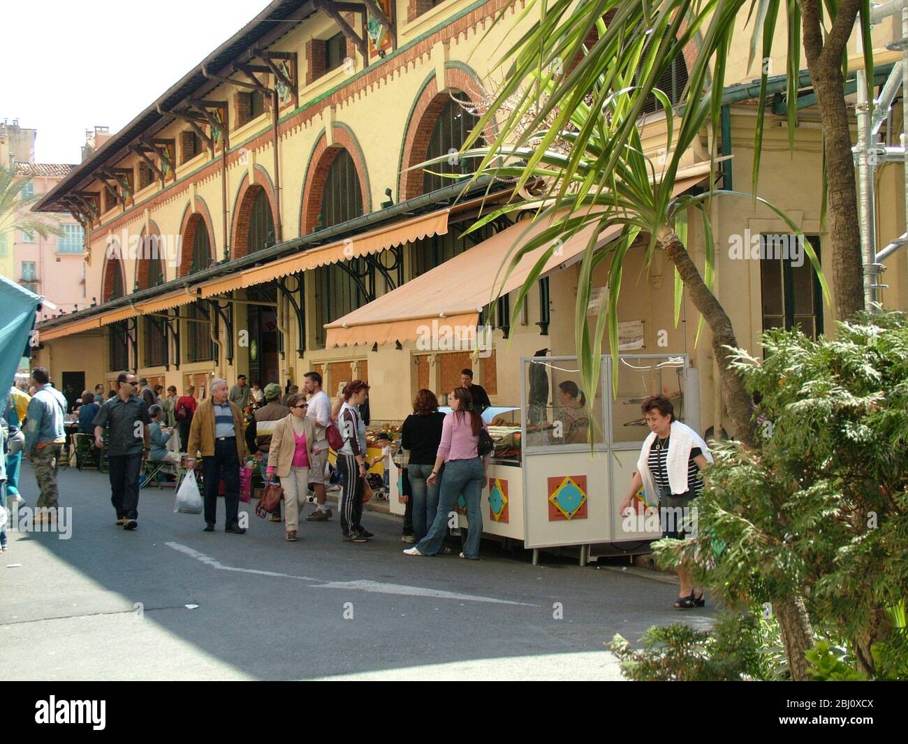 Outside the covered market in Menton, south of France - Stock Photo