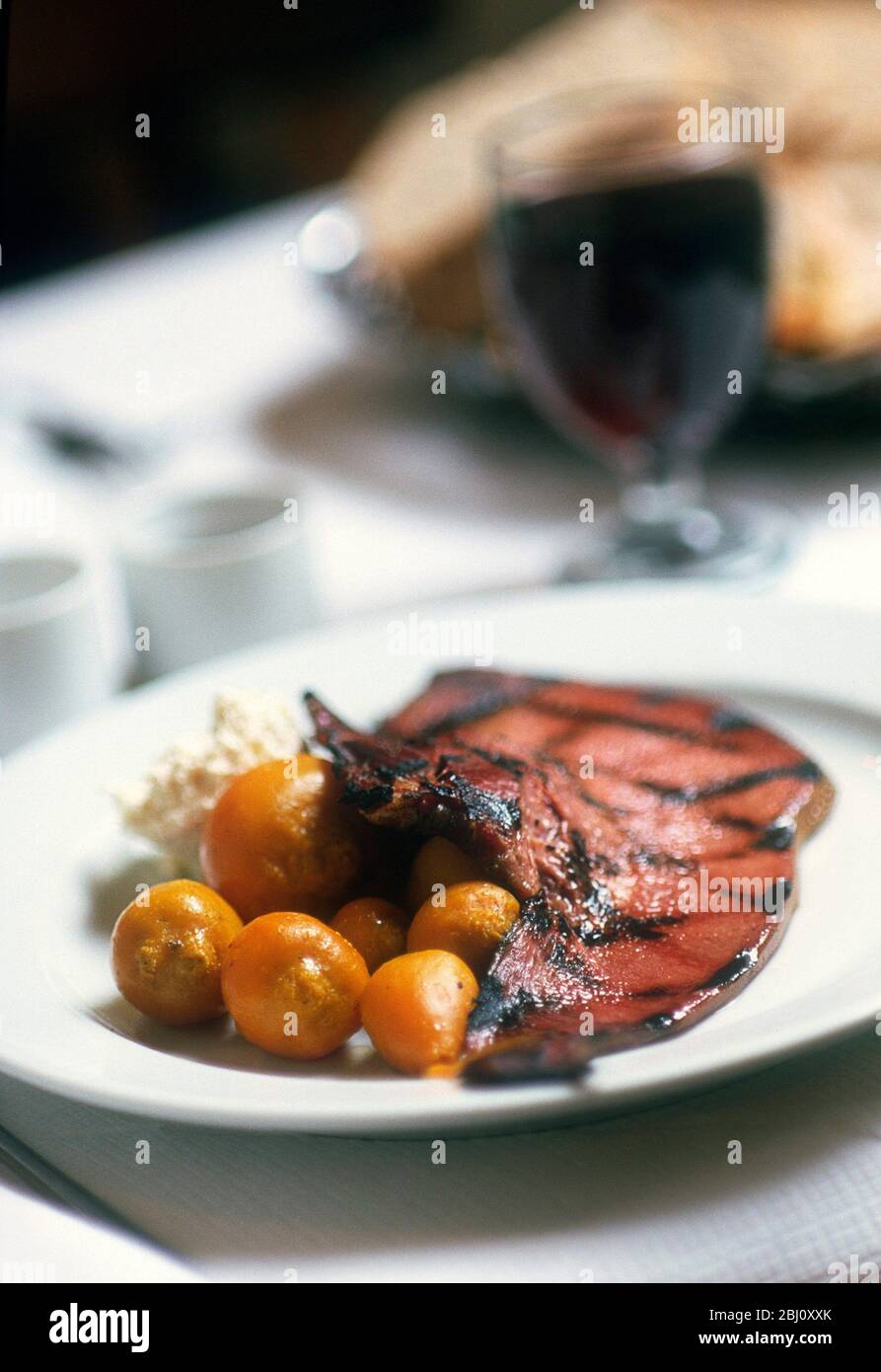 Grilled tongue and yellow beetroots at 'St John' restaurant for the Independent Magazine - Stock Photo