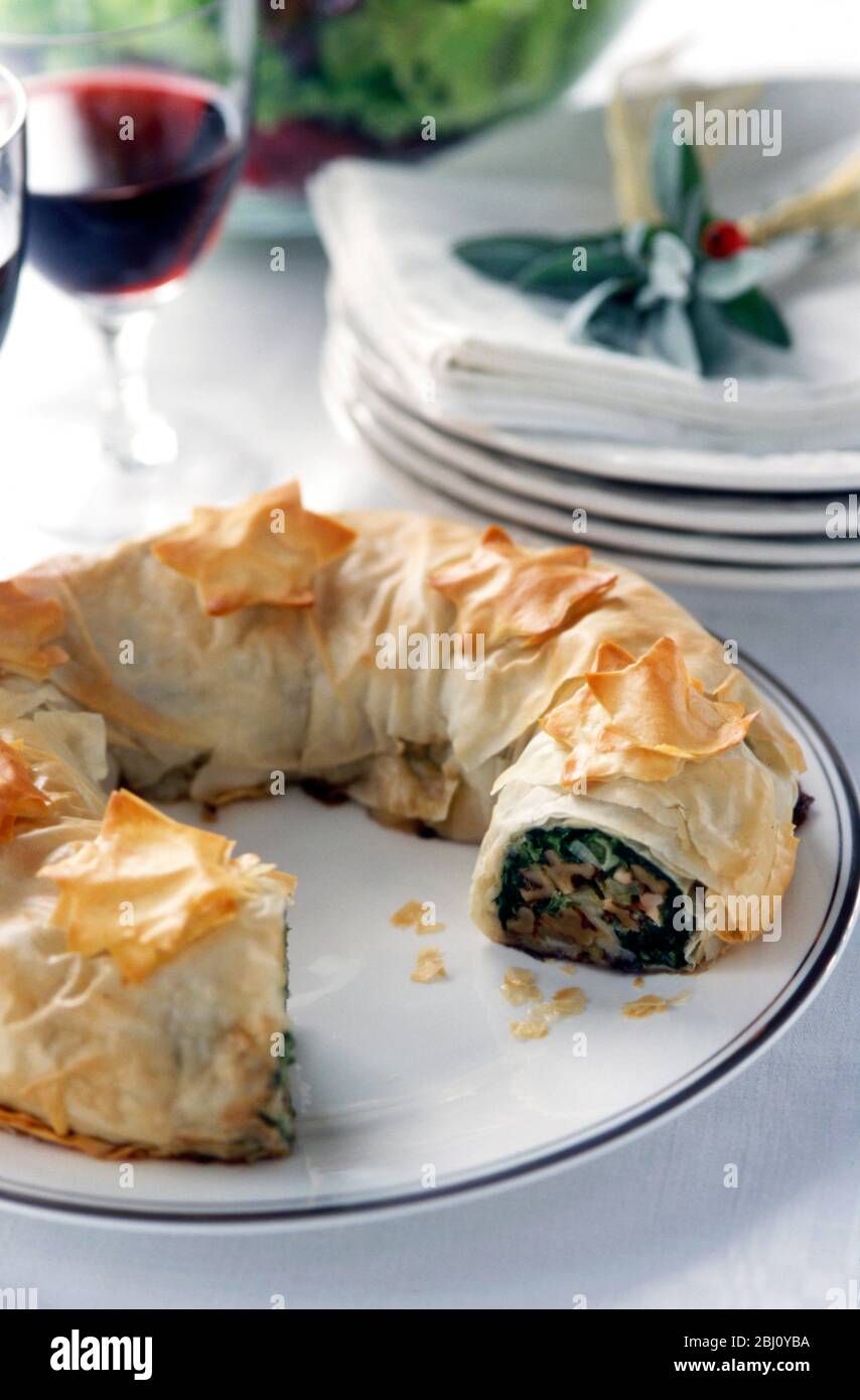 Walnut and spinach wrapped in filo pastry decorated with cutout stars