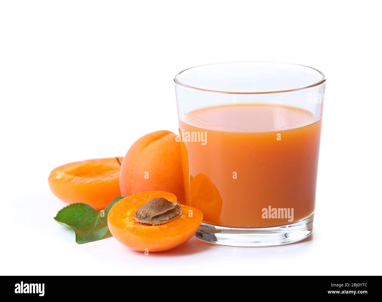 Glass of apricot juice isolated on white Stock Photo Alamy