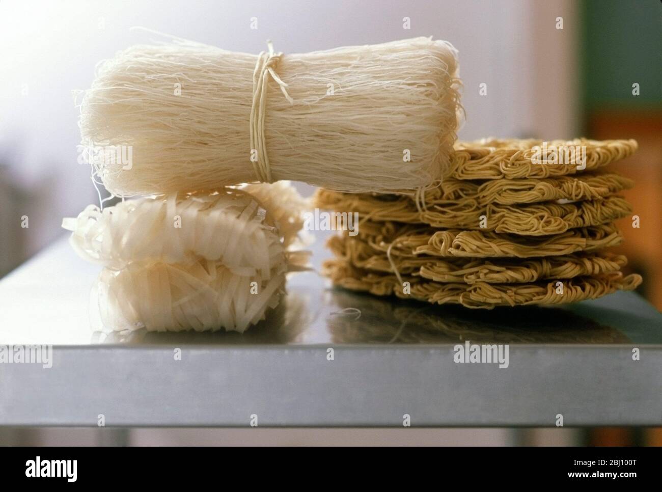 Various sorts of rice and egg noodles - Stock Photo
