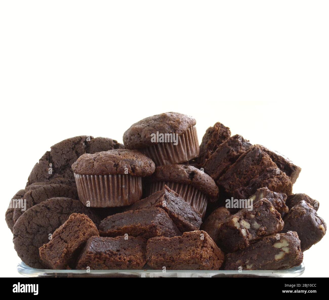 Pile of organic chocolate muffins and brownies - Stock Photo