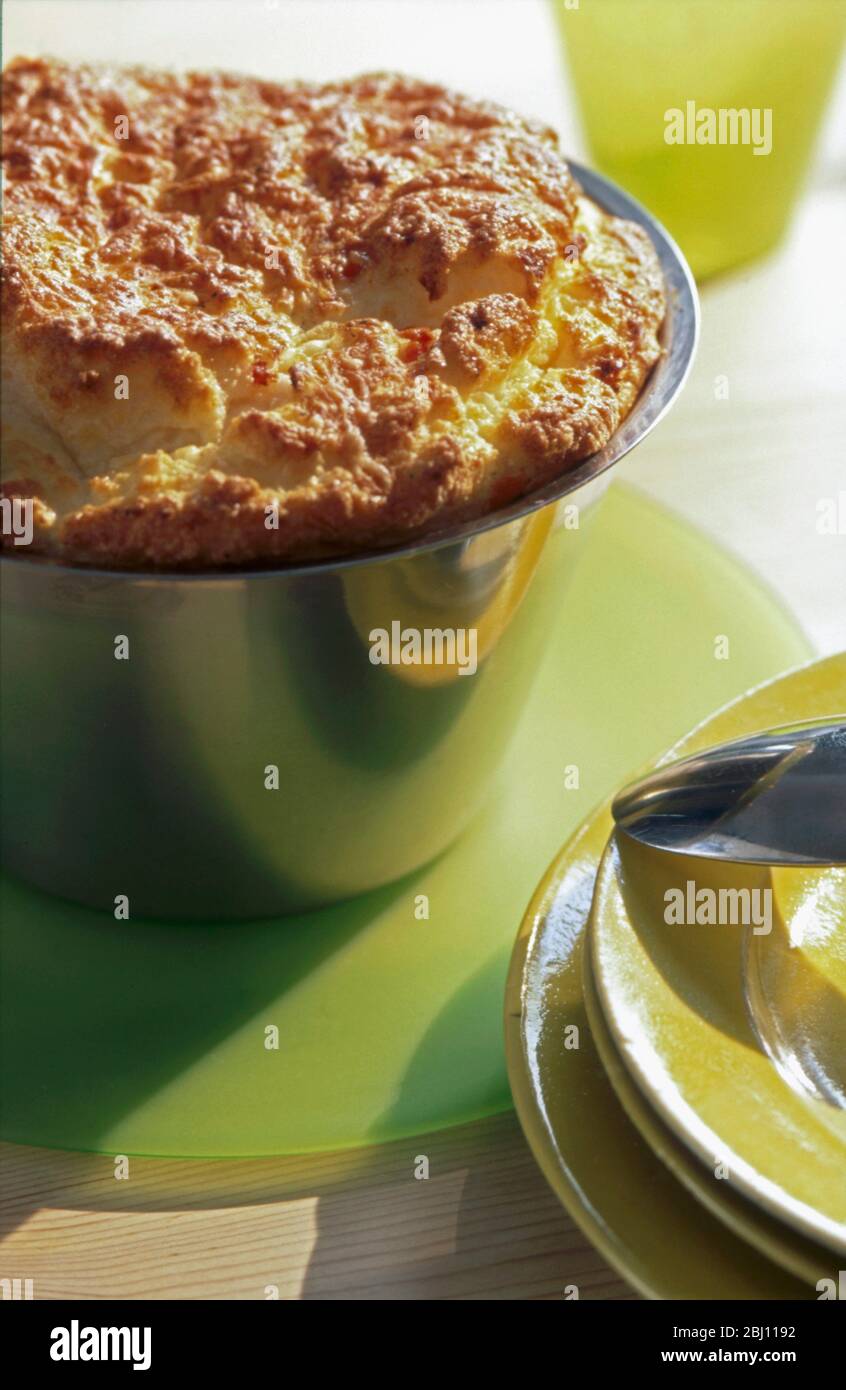 Souffle made in stainless steel mixing bowl - Stock Photo