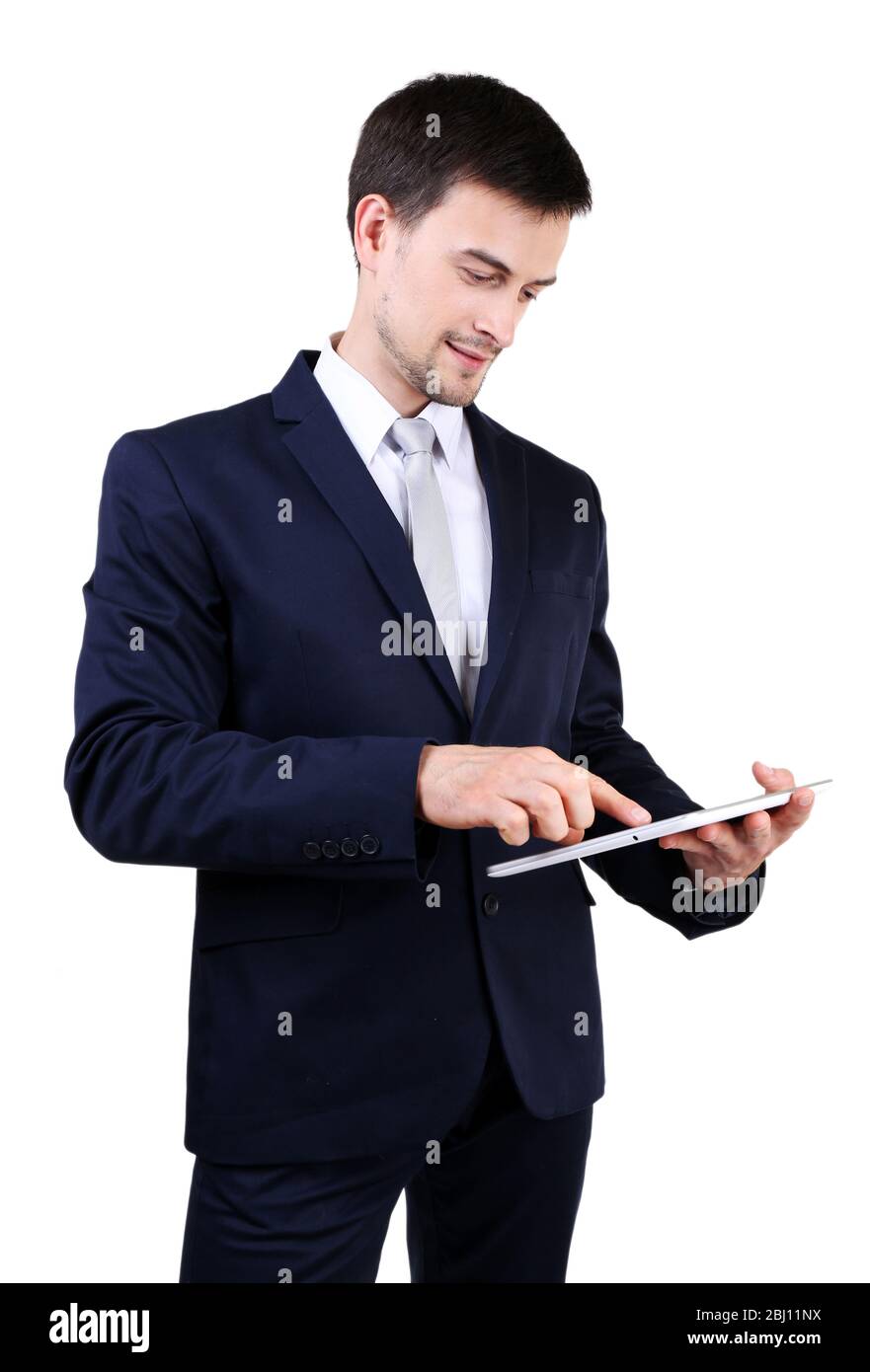 Elegant man in suit with tablet isolated on white Stock Photo - Alamy