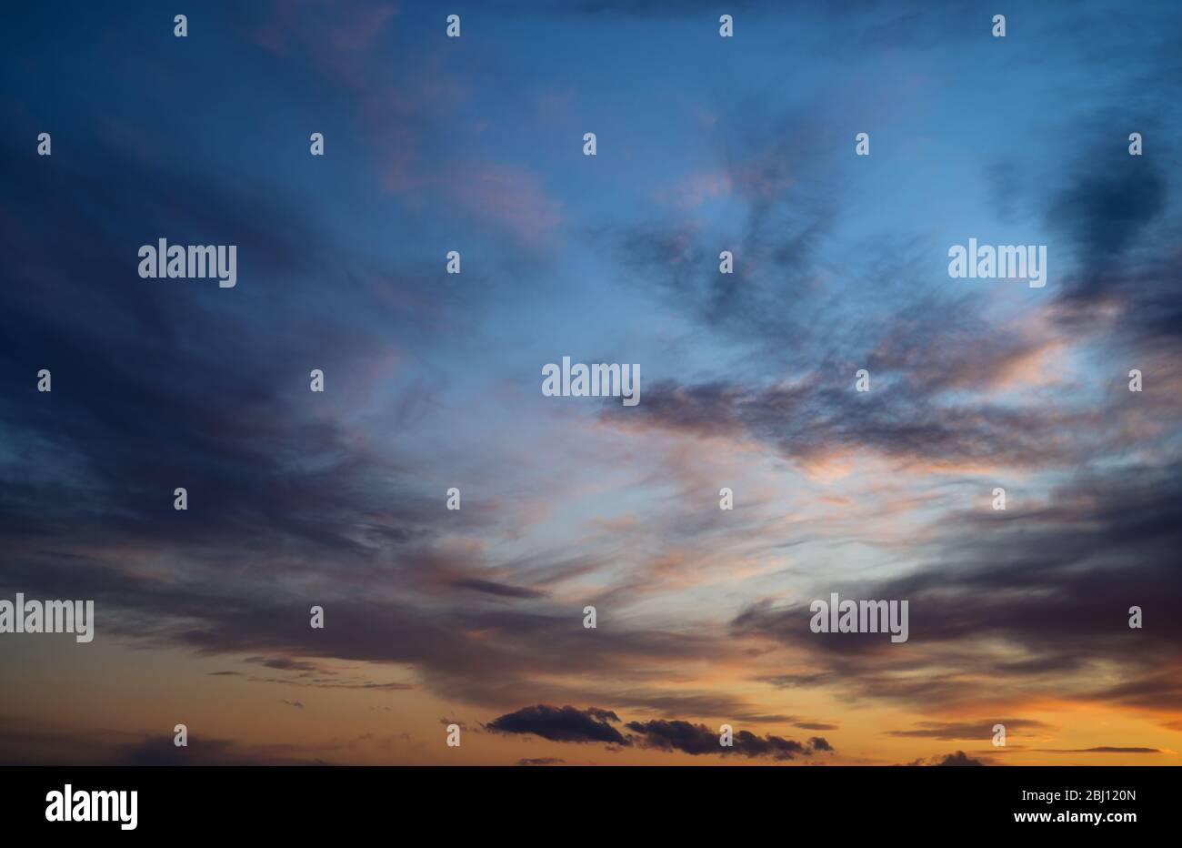 Sunset sky with clouds. Nature background Stock Photo - Alamy