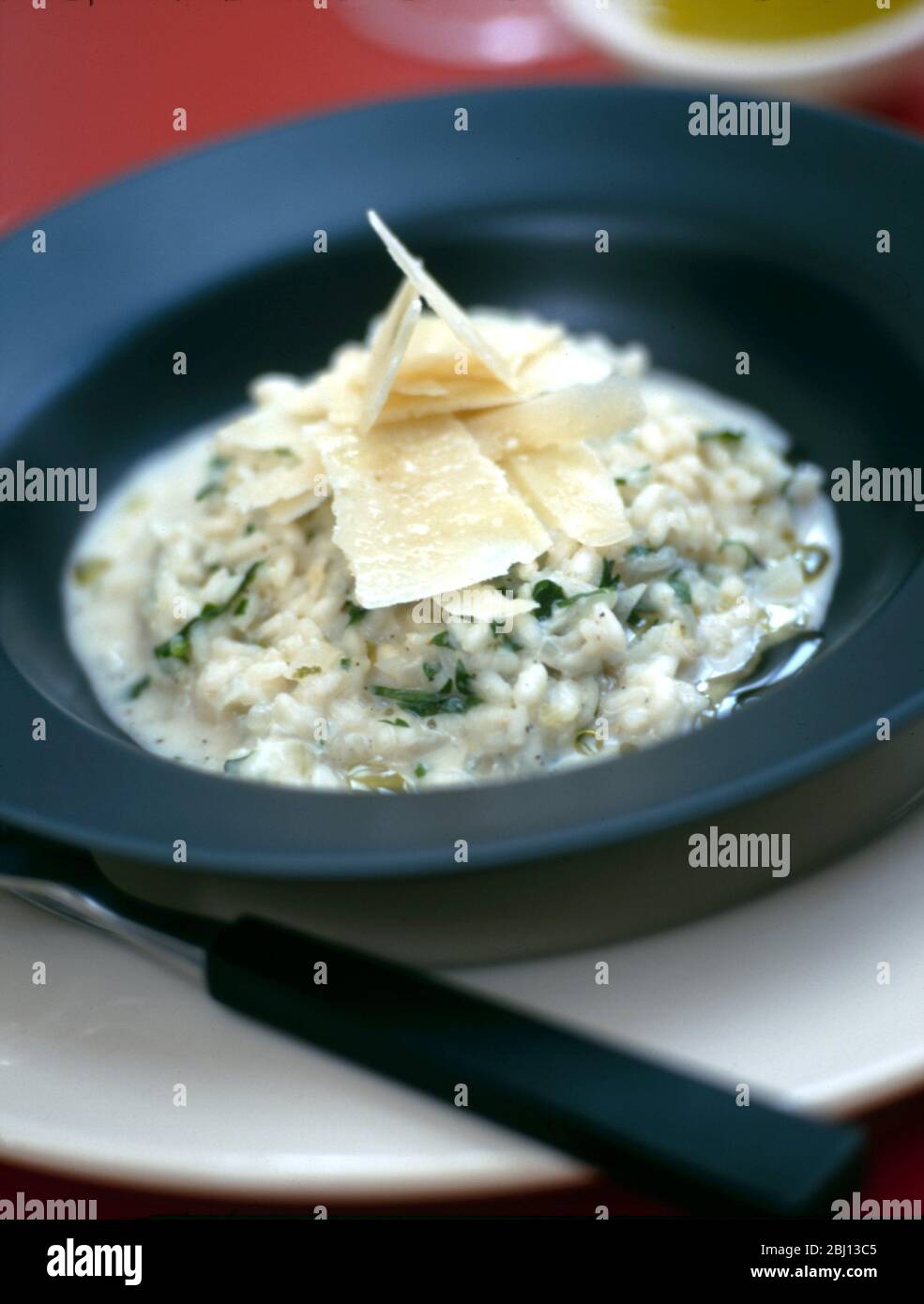 Risotto with parmesan - Stock Photo
