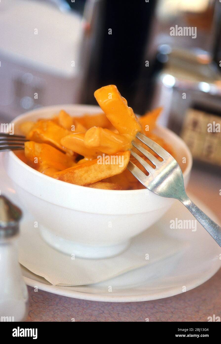 Chips in cheese - Stock Photo