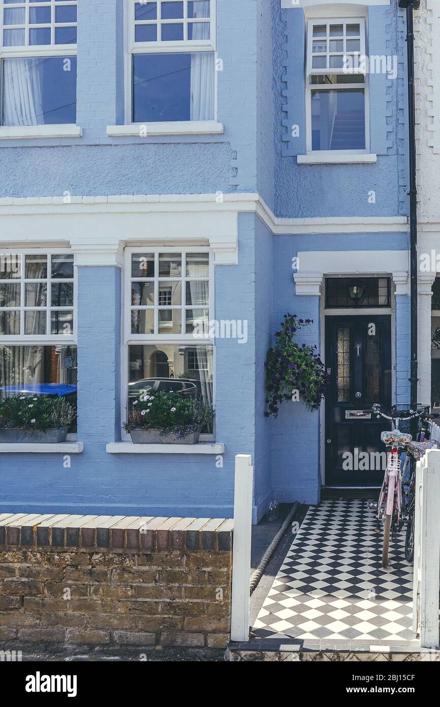 Pastelcolored terraced houses on White Hart Lane in Barnes. Terrace