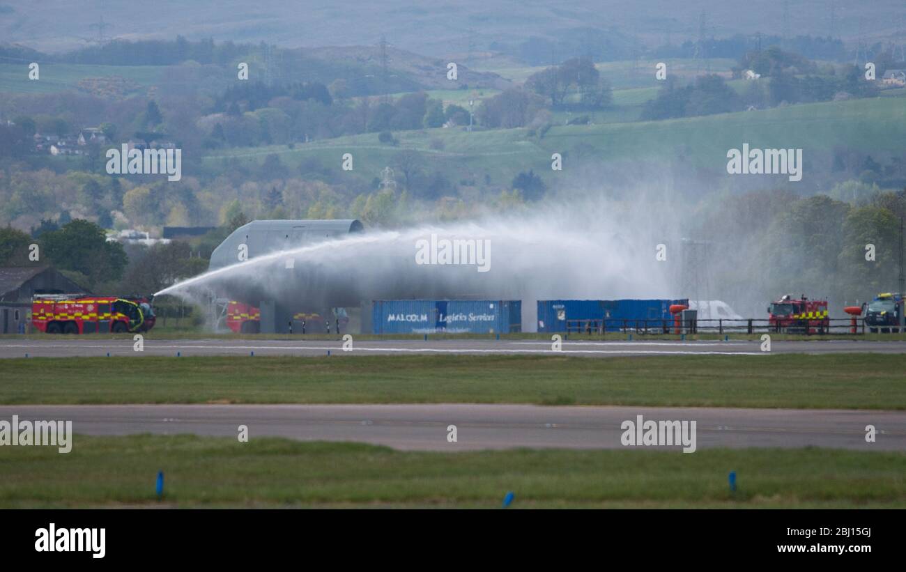 Glasgow airport fire service fire truck spraying water hires stock