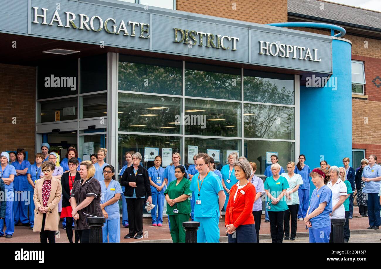 Harrogate, North Yorkshire, UK. 28th Apr, 2020. Doctors, nurses and all NHS keyworkers outside Harrogate District Hospital to honour their colleagues who lost their lives to Covid 19 observing one minute of silence. Credit: ernesto rogata/Alamy Live News Stock Photo