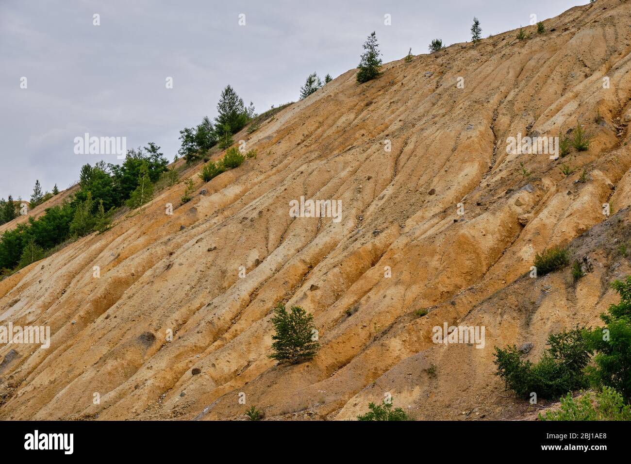 Bor / Serbia - July 13, 2019: Soil erosion and degradation due to industrial pollution in copper mine in Bor, Serbia, owned by Chinese mining company Stock Photo