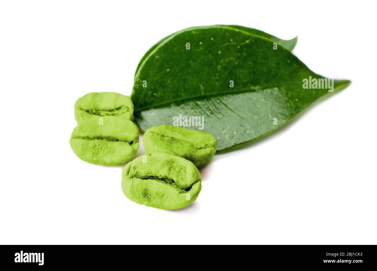 Green coffee beans with leaves isolated on white Stock Photo - Alamy