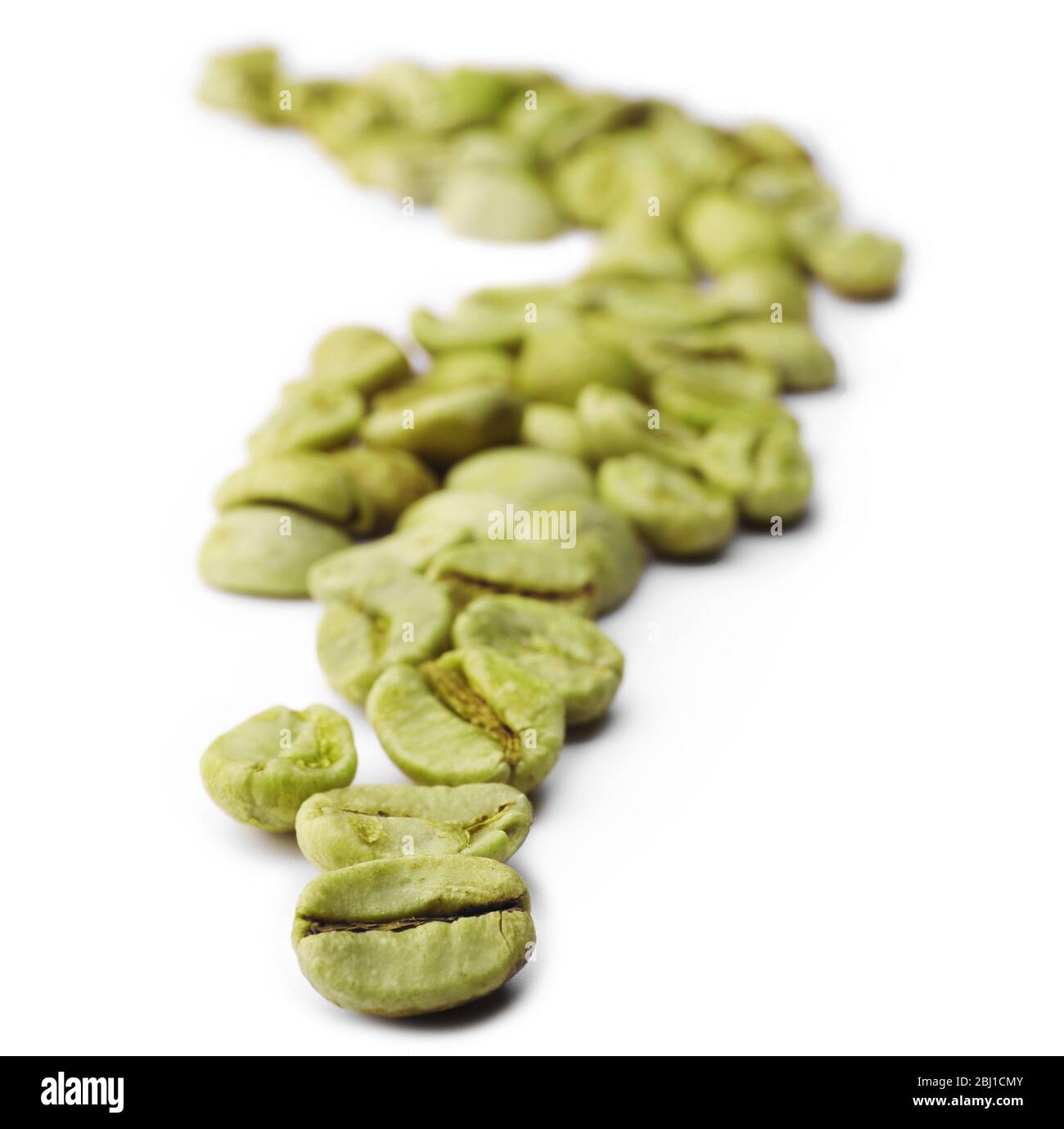 Green coffee beans isolated on white Stock Photo - Alamy