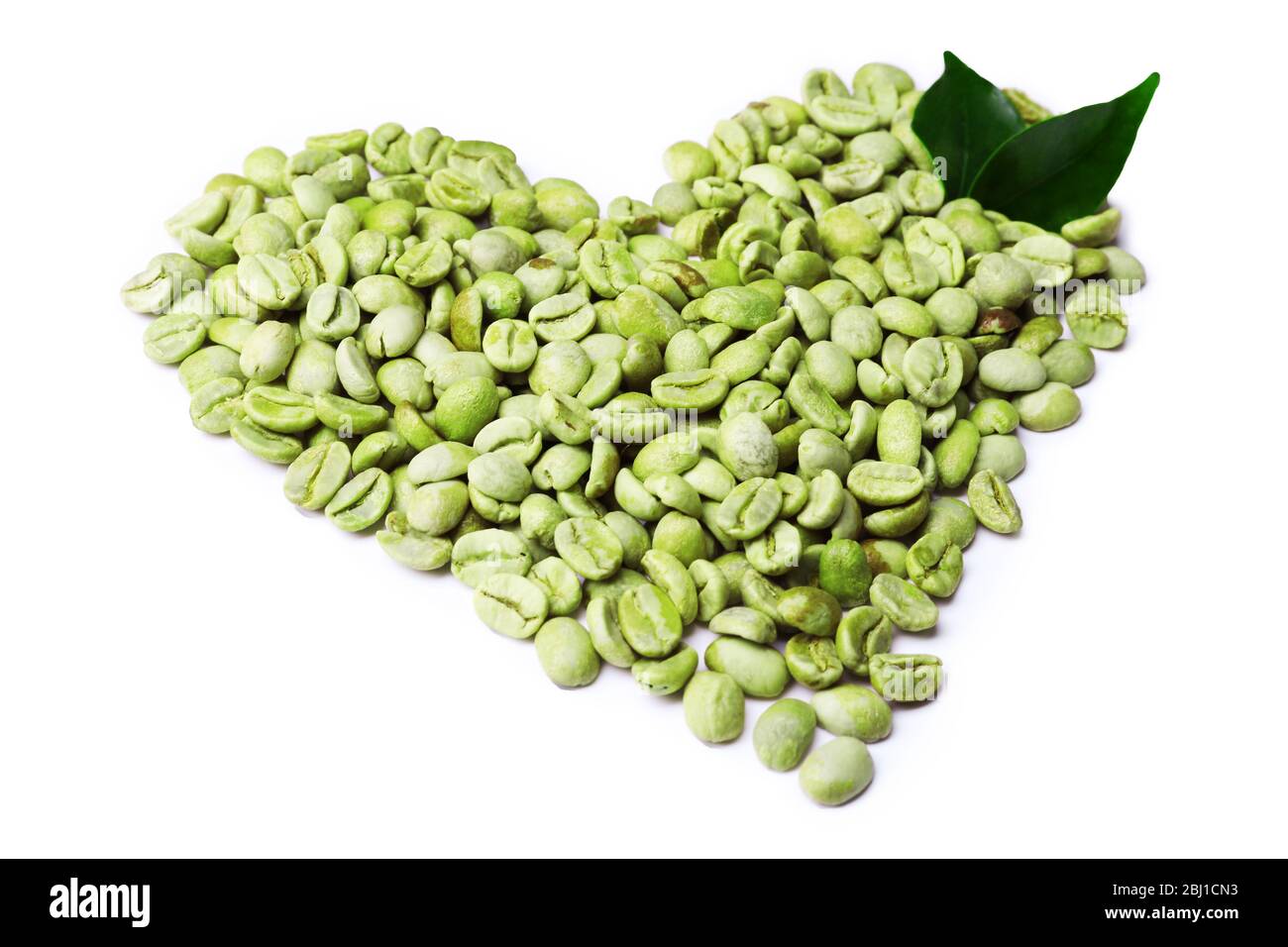 Green coffee beans with leaves isolated on white Stock Photo - Alamy