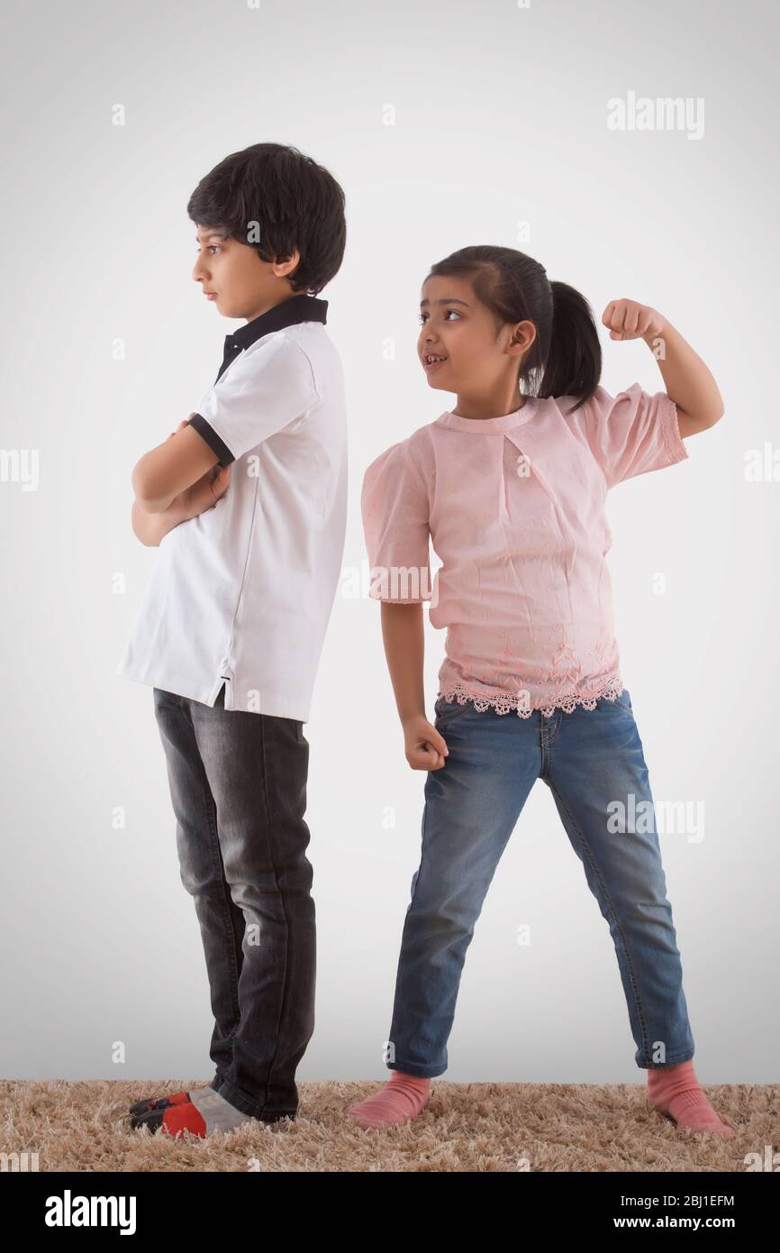 sister mocking brother after fight Stock Photo - Alamy