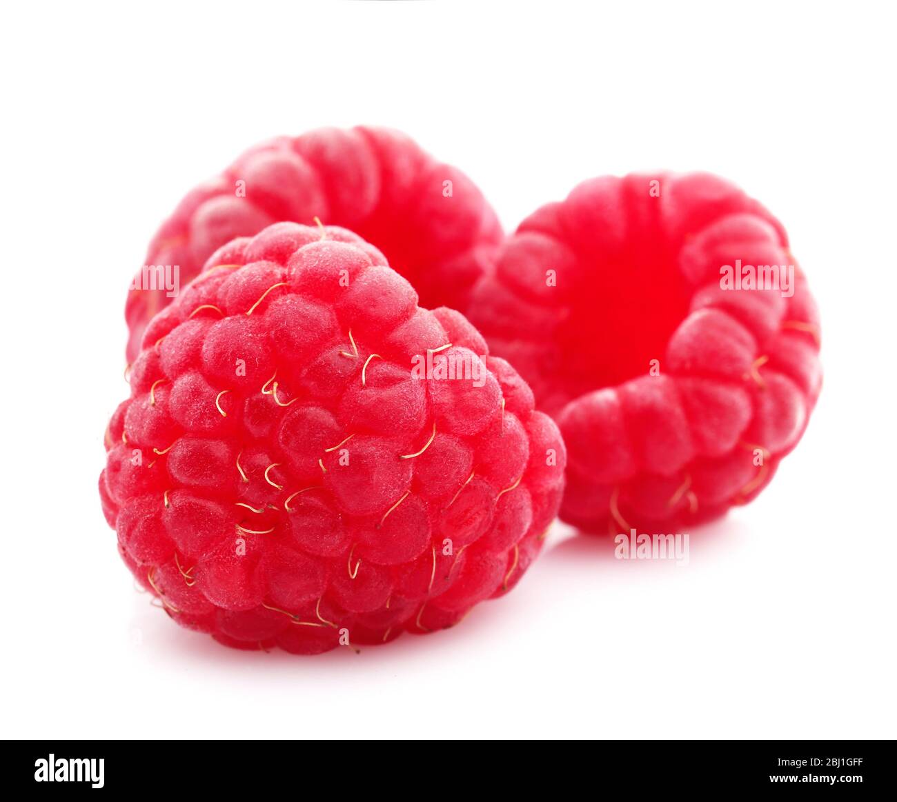 Fresh raspberries isolated on white Stock Photo - Alamy