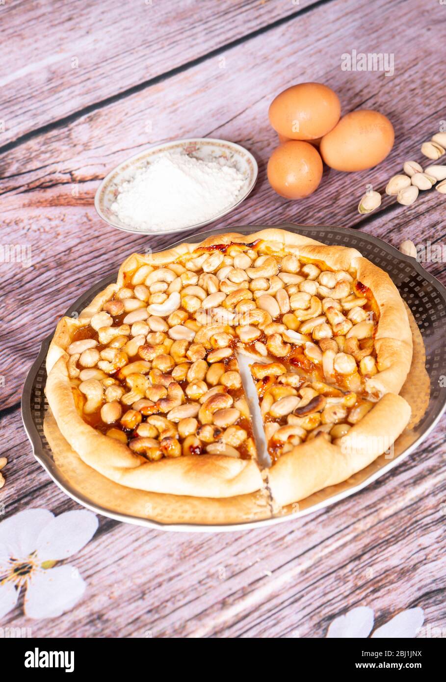 a mom fruit dried tart in the wood table and ingredient Stock Photo