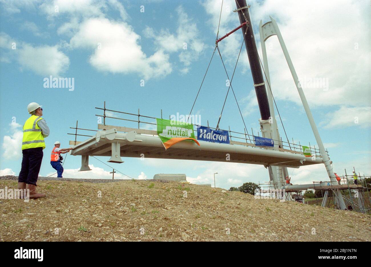 Lifting pre-formed bridge into place, UK Stock Photo