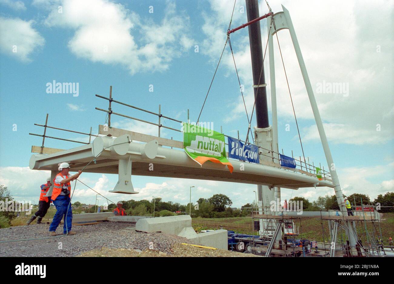 Lifting pre-formed bridge into place, UK Stock Photo