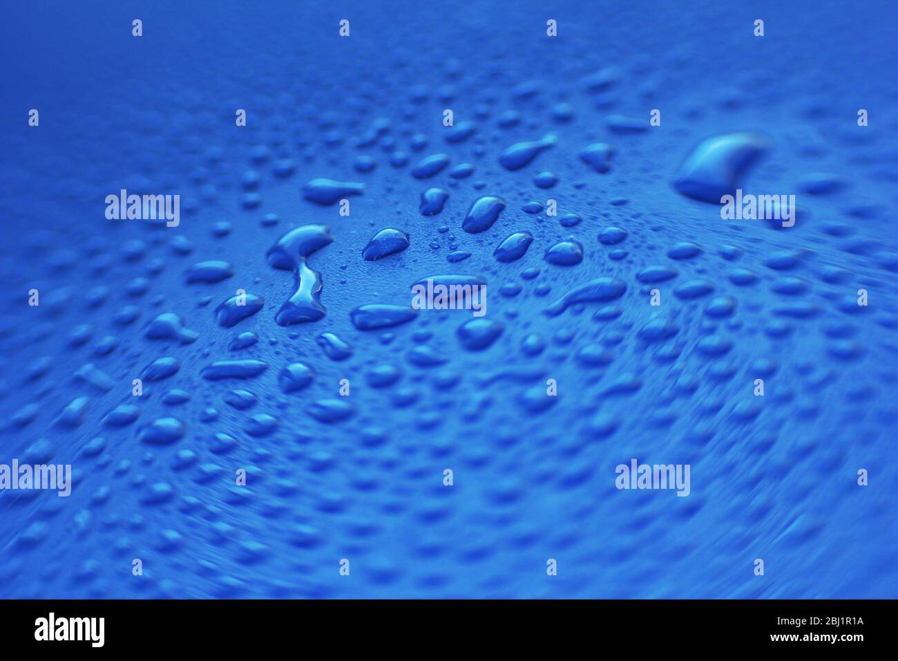 Abstract water drops background Stock Photo - Alamy