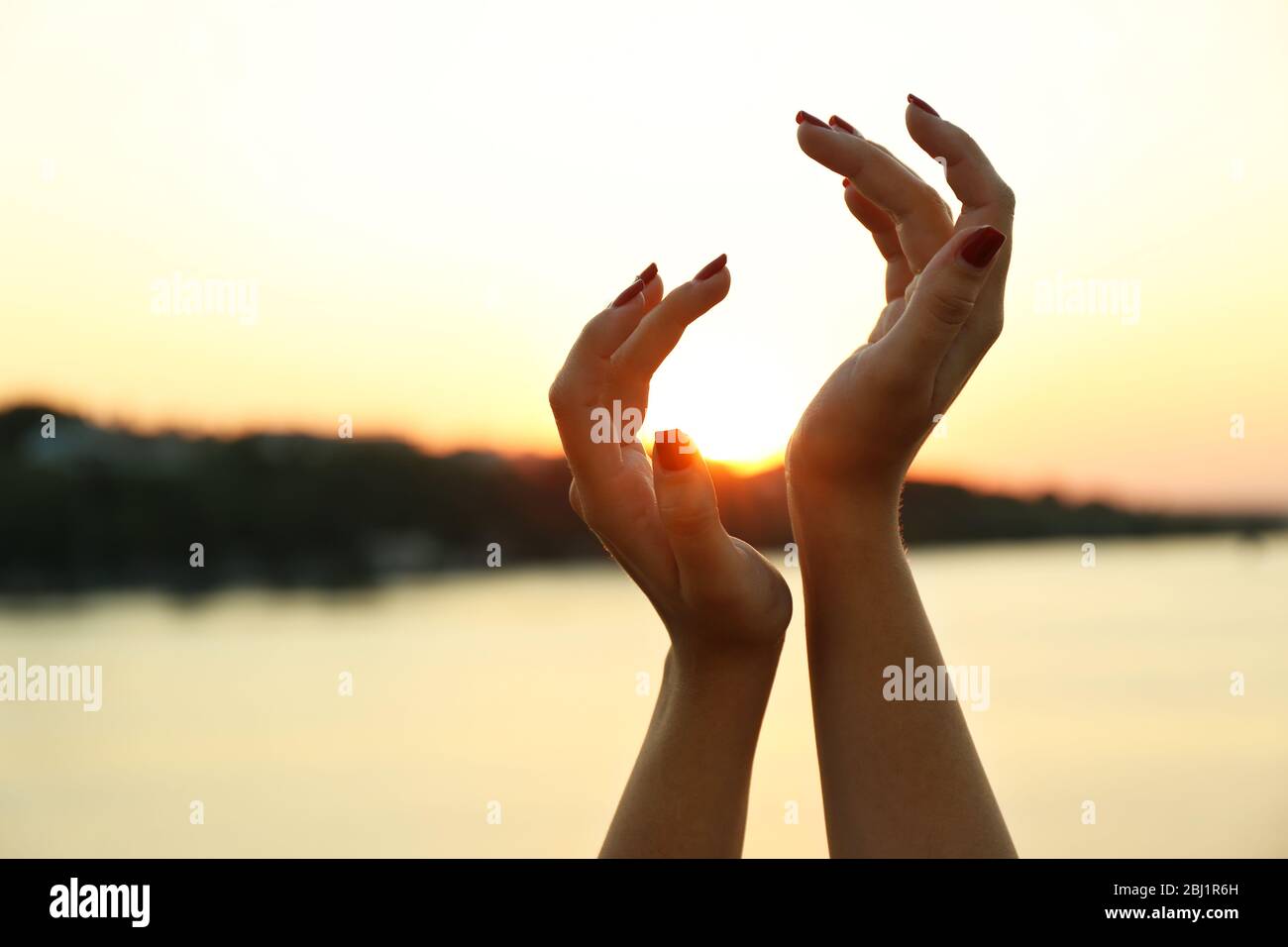 Female hands on sunny hi-res stock photography and images - Alamy