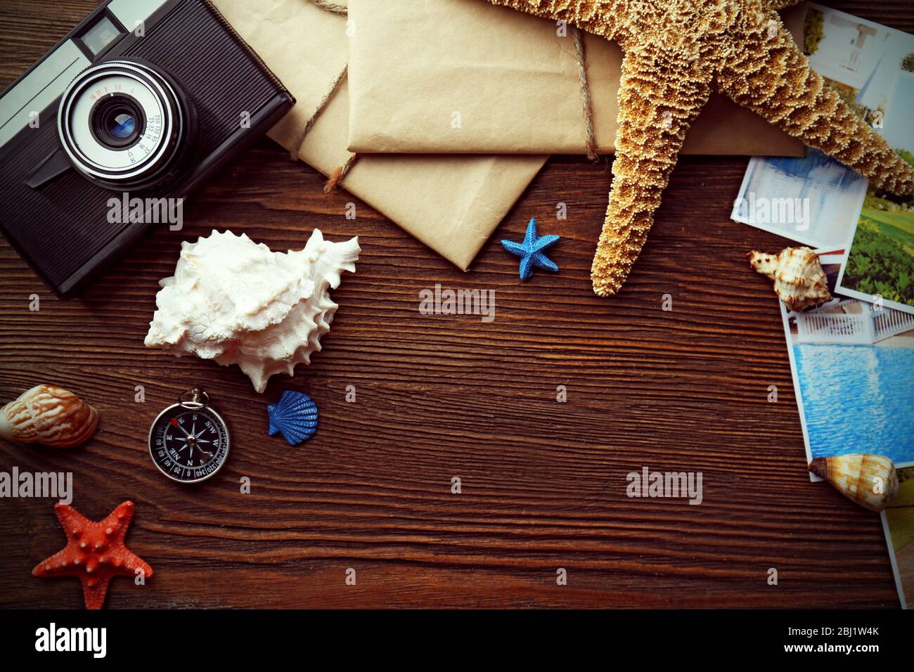 Beautiful composition with sea accessories and camera on table close up Stock Photo