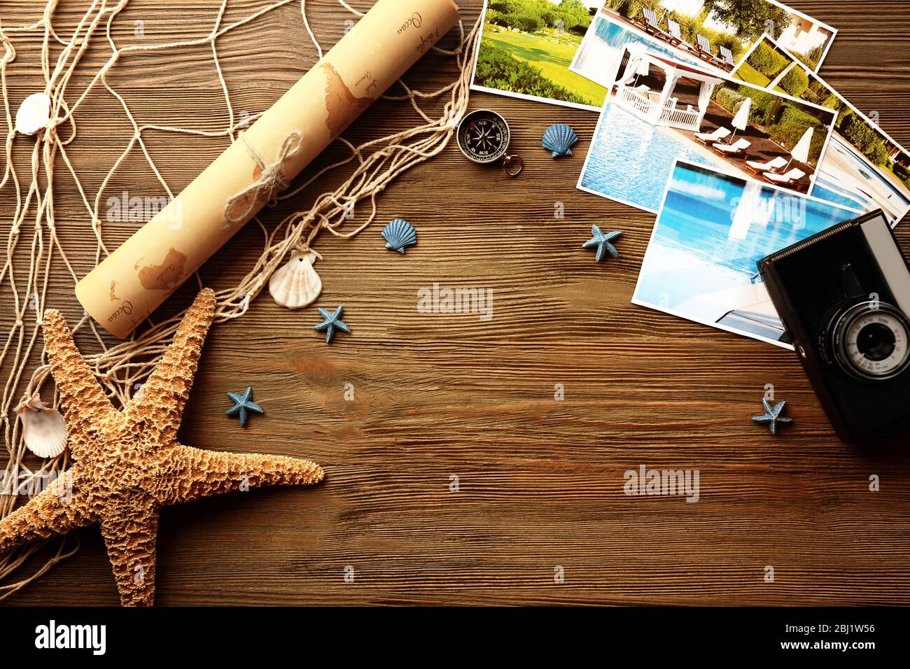 Beautiful composition with sea accessories and camera on table close up Stock Photo