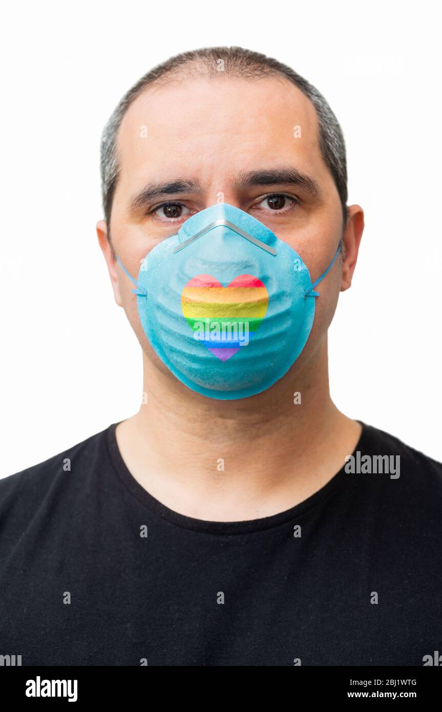 man with a lgbt medical mask on white background Stock Photo