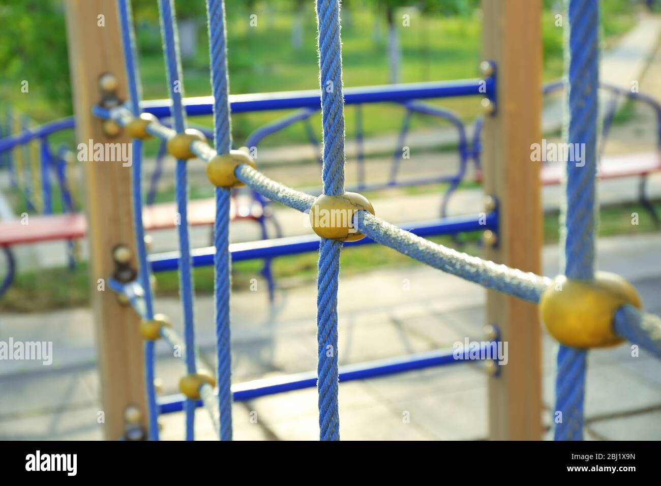 Climbing ropes on children playground in park Stock Photo - Alamy
