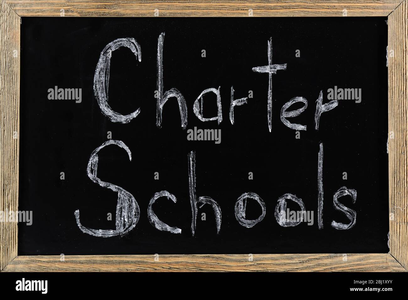 Charter Schools written on chalkboard Stock Photo