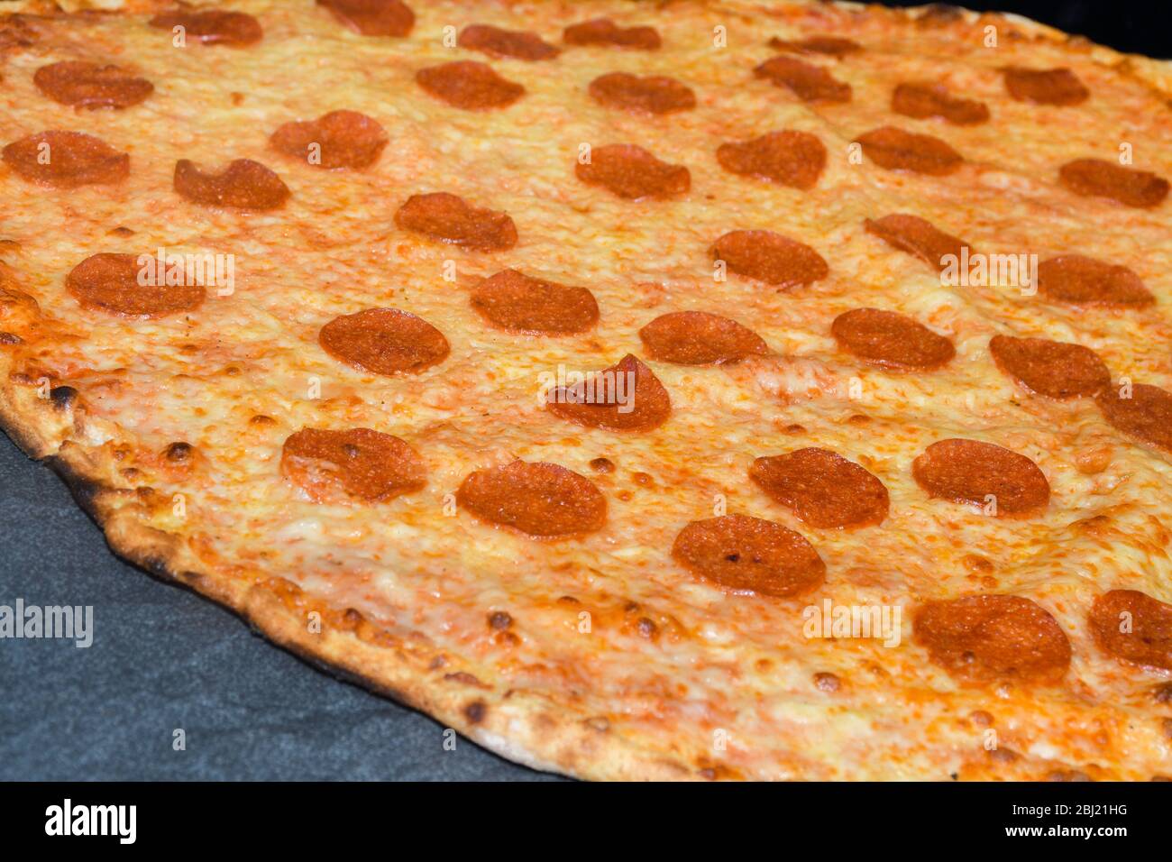 Pizza pepperoni is a style of pizza in Italian cuisine prepared with