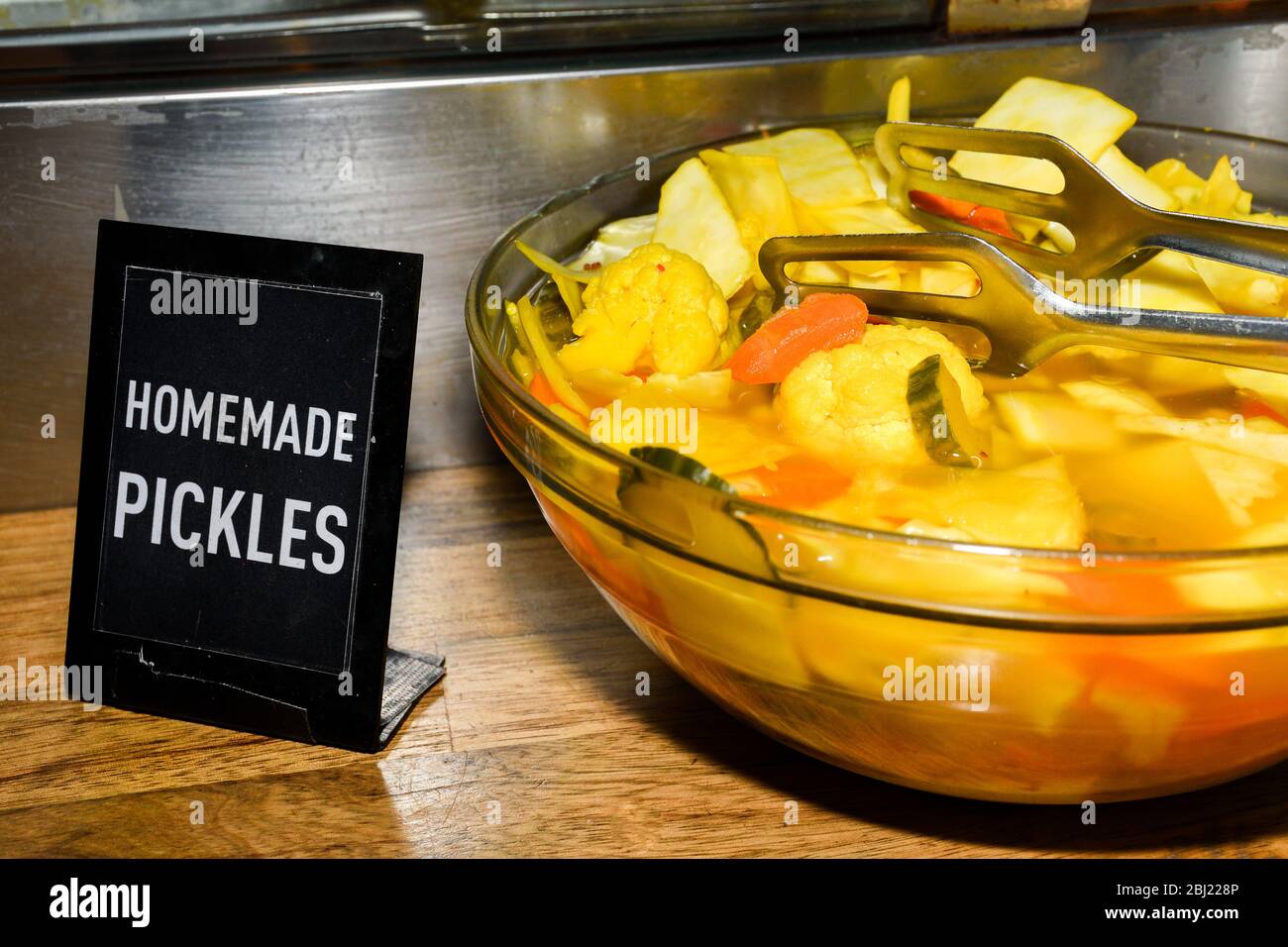 Assorted mix of pickles in sunlight during food festival. Pickled