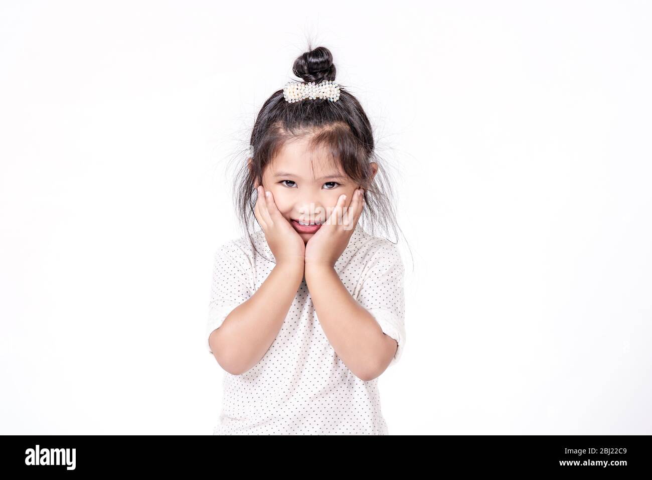portrait of asian little girl over white background Stock Photo - Alamy