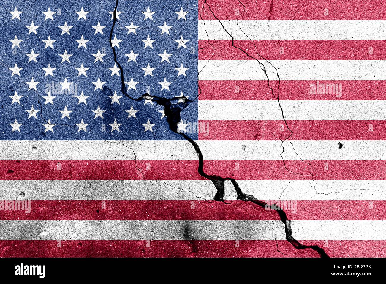 USA flag on cracked concrete wall. The concept of crisis, default, economic collapse, pandemic, conflict, terrorism or other problems in the country. Stock Photo