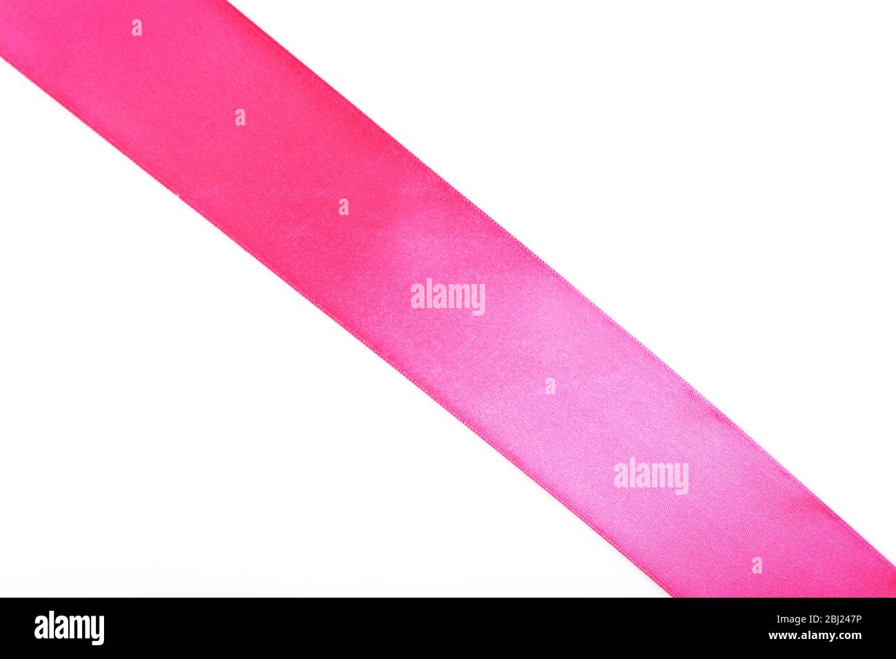 Pink satin ribbon isolated on white Stock Photo - Alamy