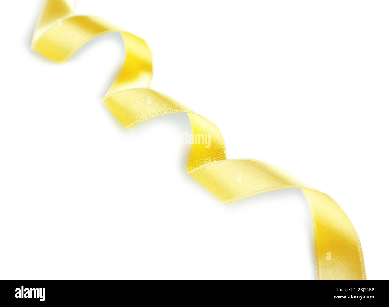Yellow Curly Ribbon Yellow curly ribbon isolated on white Stock Photo - Alamy