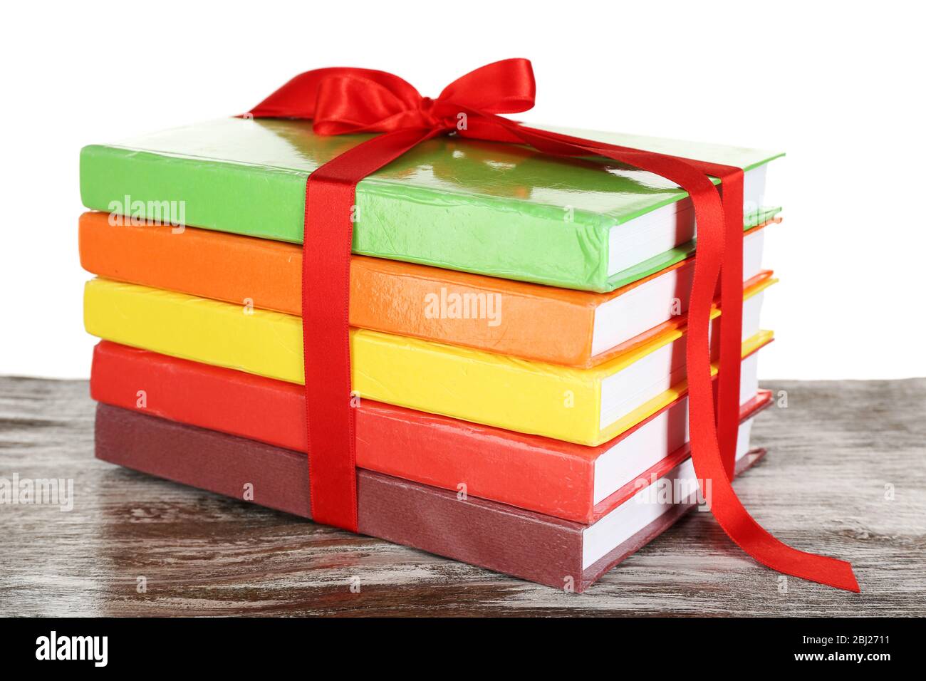 Book Stack With Ribbon Mark Stack of books with ribbon on light background Stock Photo - Alamy