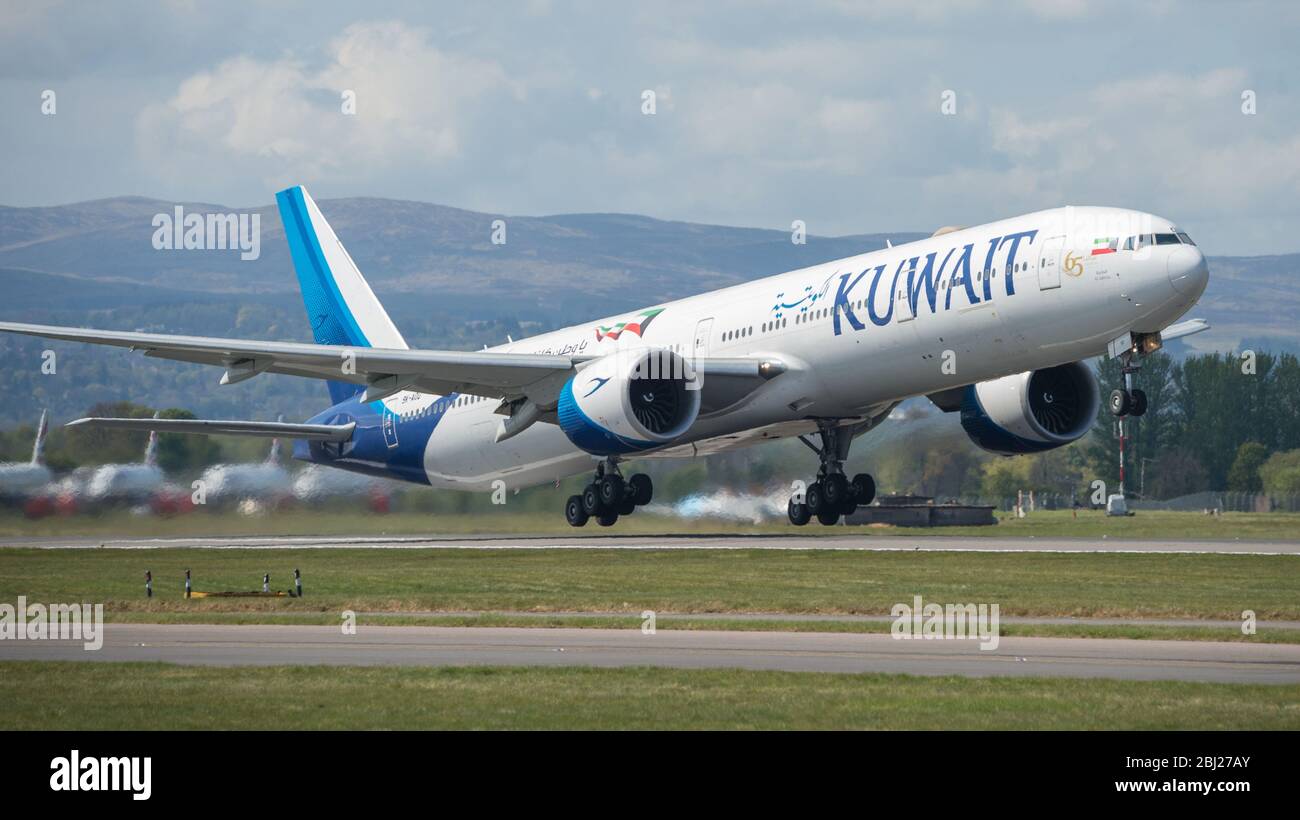 Glasgow, UK. 28th Apr, 2020. Pictured: Kuwait Airways repatriation flight for Kuwait Nationals stranded overseas due to the Coronavirus outbreak, seen taking off from Glasgow International Airport for Kuwait City. The national airline sent over a wide body Boeing 777-300ER Aircraft seen landing earlier at Glasgow this morning during the Coronavirus (COVID19) extended lockdown. Glasgow Airport does not presently operate any scheduled flights to or from Kuwait normally. Credit: Colin Fisher/Alamy Live News Stock Photo