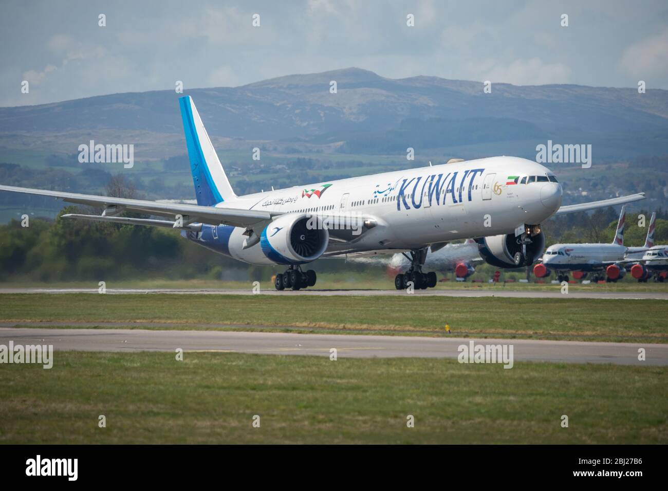 Kuwait airways boeing 777 taking off from glasgow airport hires stock