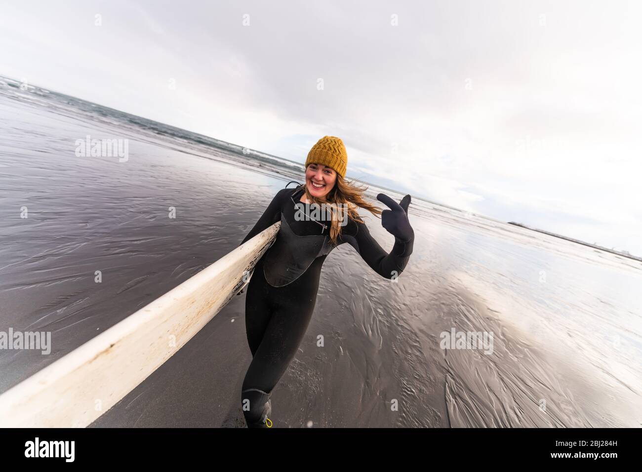 Female in black wetsuit hi-res stock photography and images - Alamy
