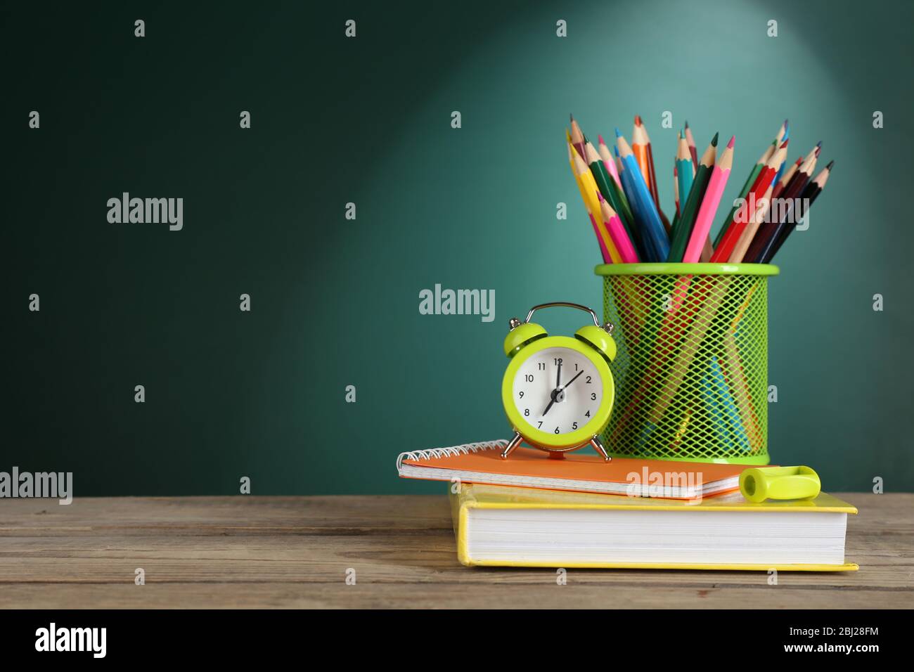 Back to school template on green chalkboard background Stock Photo - Alamy