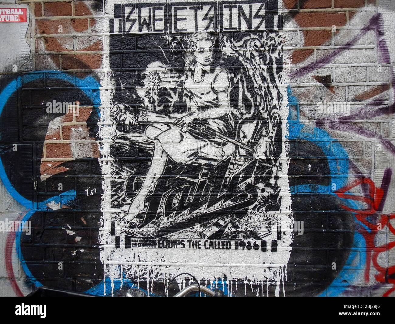 Poster and graffiti Stock Photo - Alamy