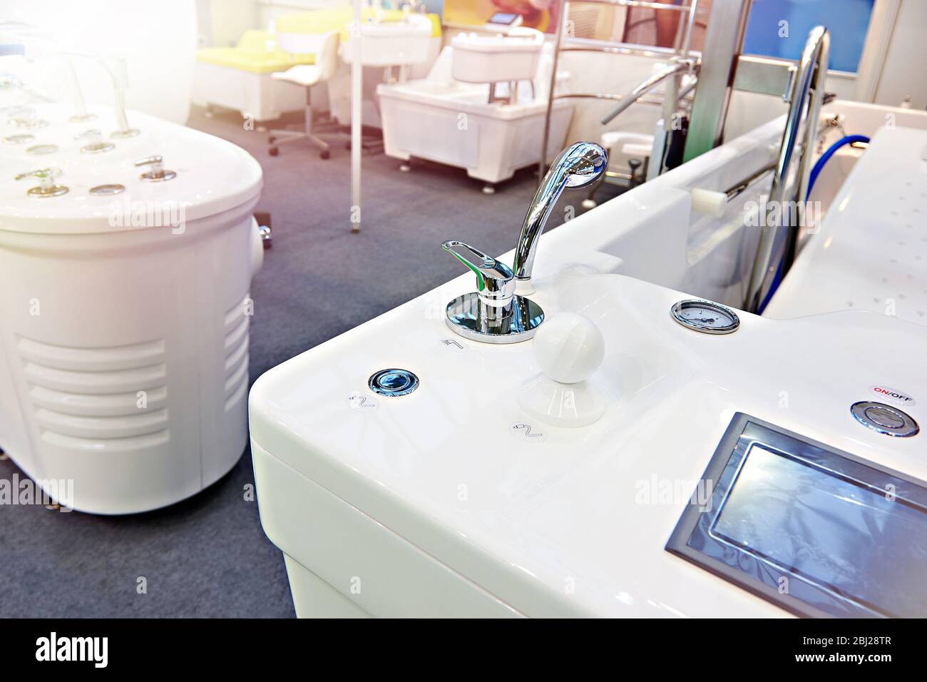 Modern bathtubs and jacuzzi in the store Stock Photo