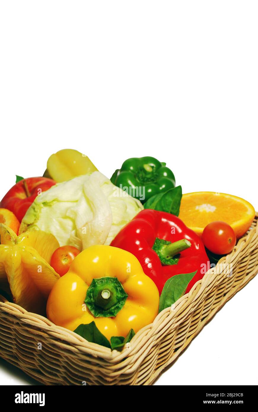 Fruits and vegetables in a box isolated Stock Photo - Alamy