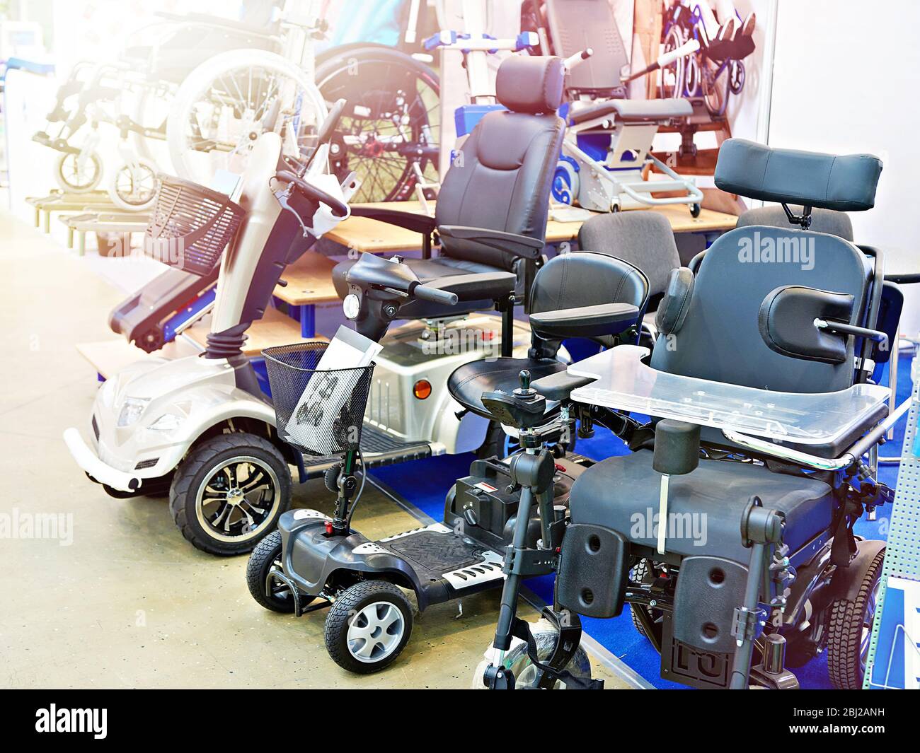 Wheelchairs with electric motor on exhibition store Stock Photo