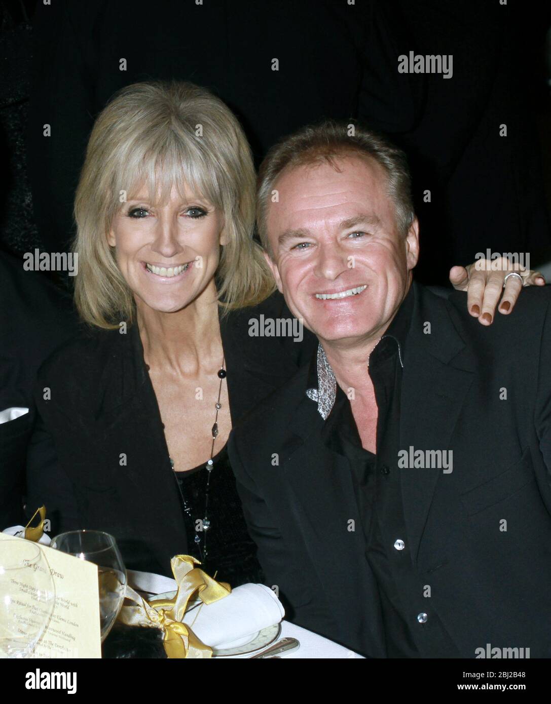 Television comedian Bobby Davro and girlfriend Vicky Wright at an event in the Dorchester Hotel, London, England 2012. Stock Photo