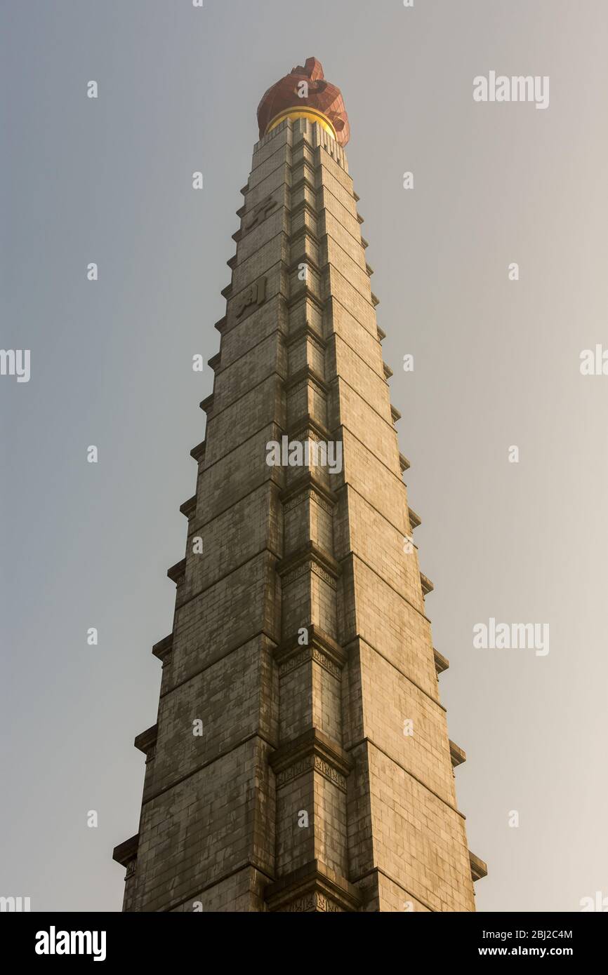 Pyongyang / DPR Korea - November 10, 2015: 170 meters tall Juche tower, monument in Pyongyang, capital of North Korea, named after the ideology of Juc Stock Photo